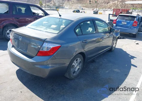 2012 Honda Civic Hybrid z USA, uszkodzony, nr VIN JHMFB4F20CS010796